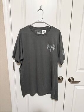 Buck Wear t-shirt XL new with tag We Don’t Run We Reload